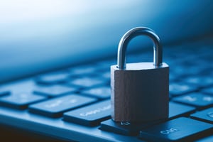 Close-up of a closed padlock on a computer keyboard