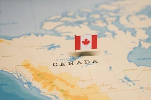 The Flag of Canada on the World Map.